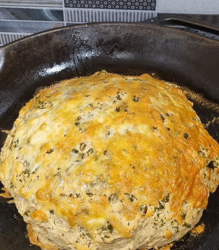 Quick skillet bread baked with stoneground wholegrain flour, cooked in a cast-iron pan and ready in under 30 minutes